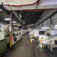 Plastic injection molding machines on production floor at B-Pen Plastic Malaysia